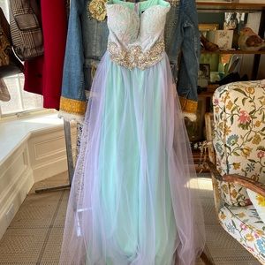 Ethereal strapless beaded prom formal gown